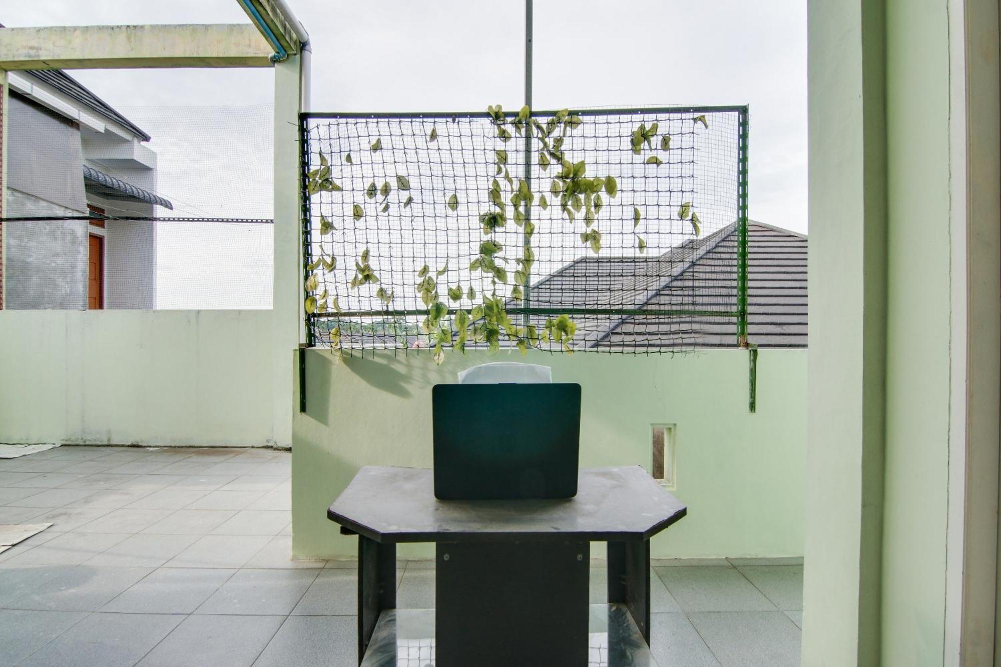Spot On 91858 Raja Homestay Syariah Pekanbaru Luaran gambar