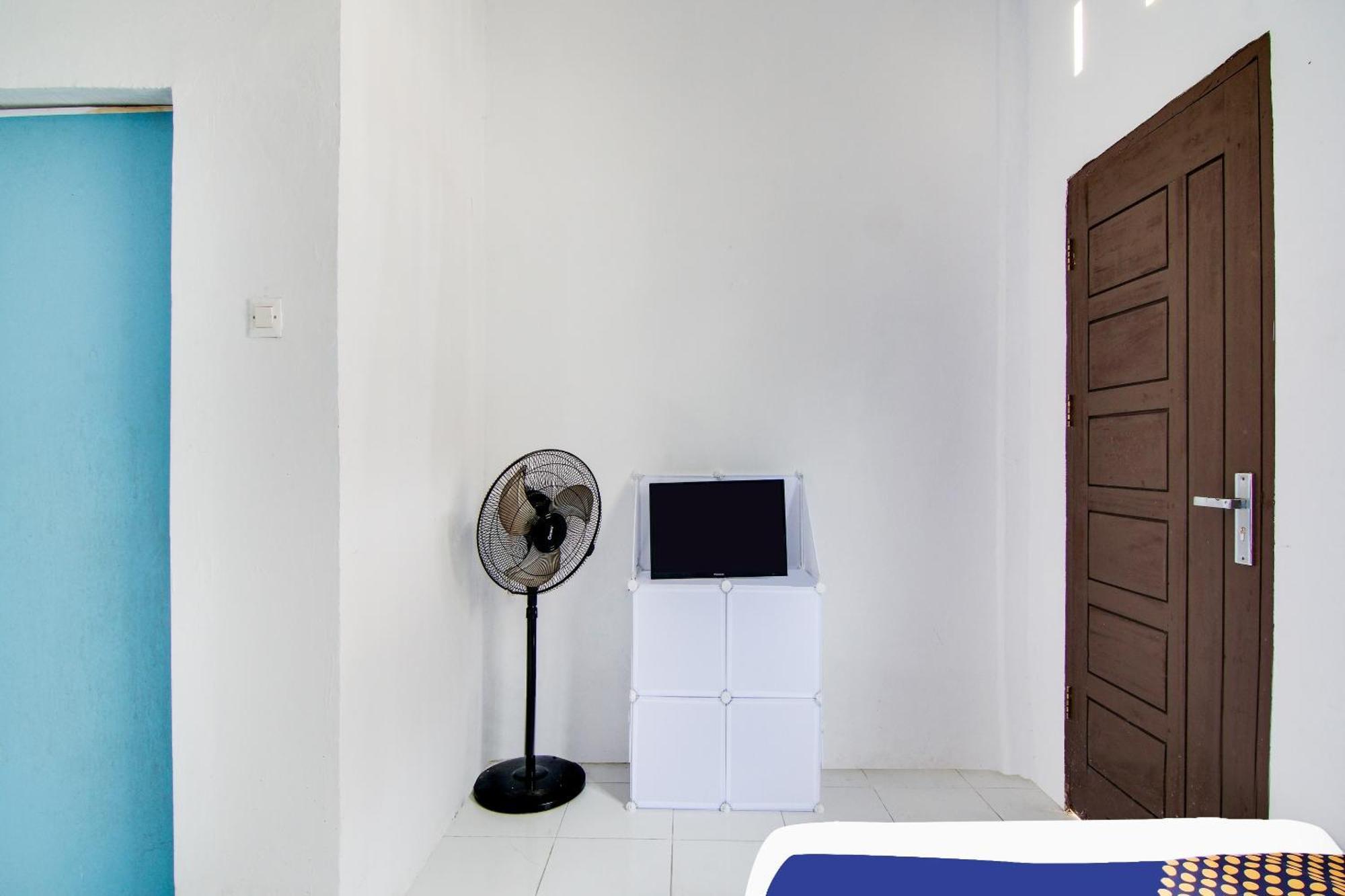 Spot On 91858 Raja Homestay Syariah Pekanbaru Luaran gambar