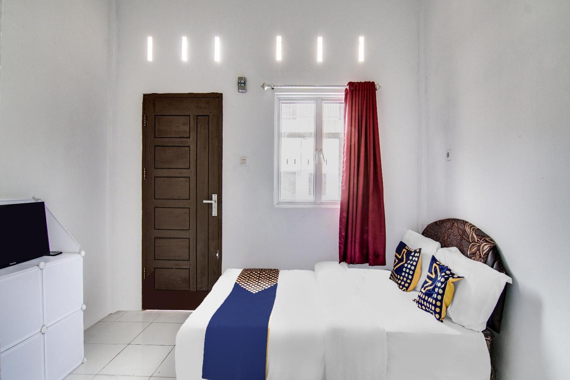 Spot On 91858 Raja Homestay Syariah Pekanbaru Luaran gambar