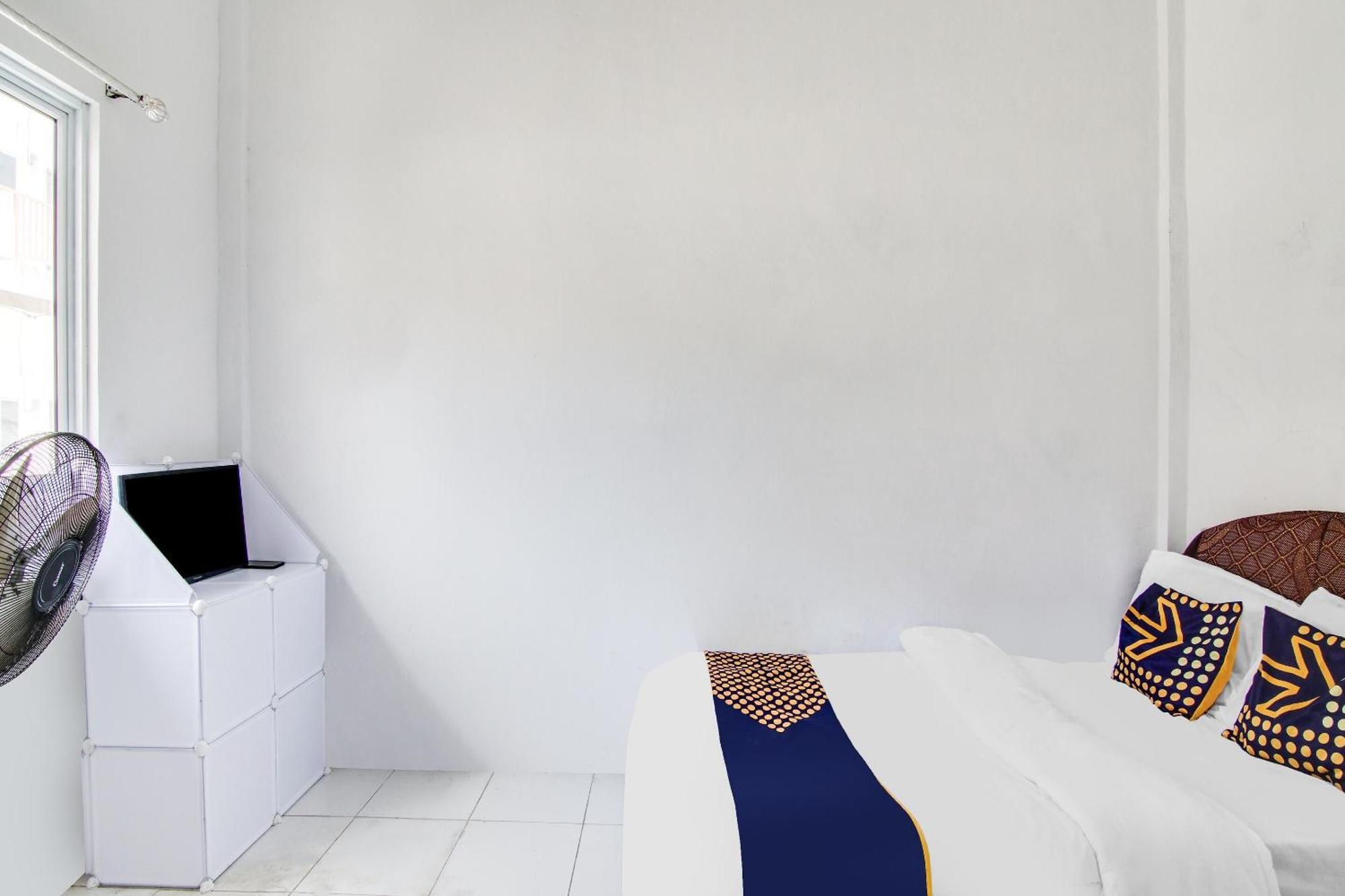 Spot On 91858 Raja Homestay Syariah Pekanbaru Luaran gambar